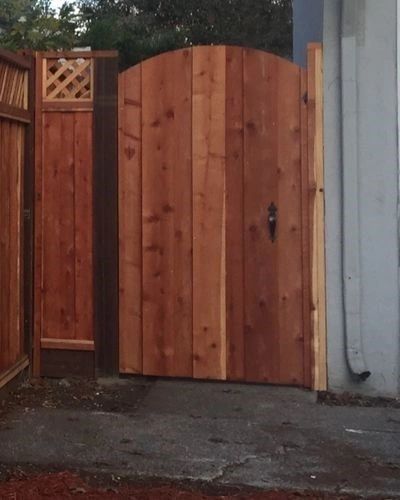 Custom wood gate with curved Z-frame design