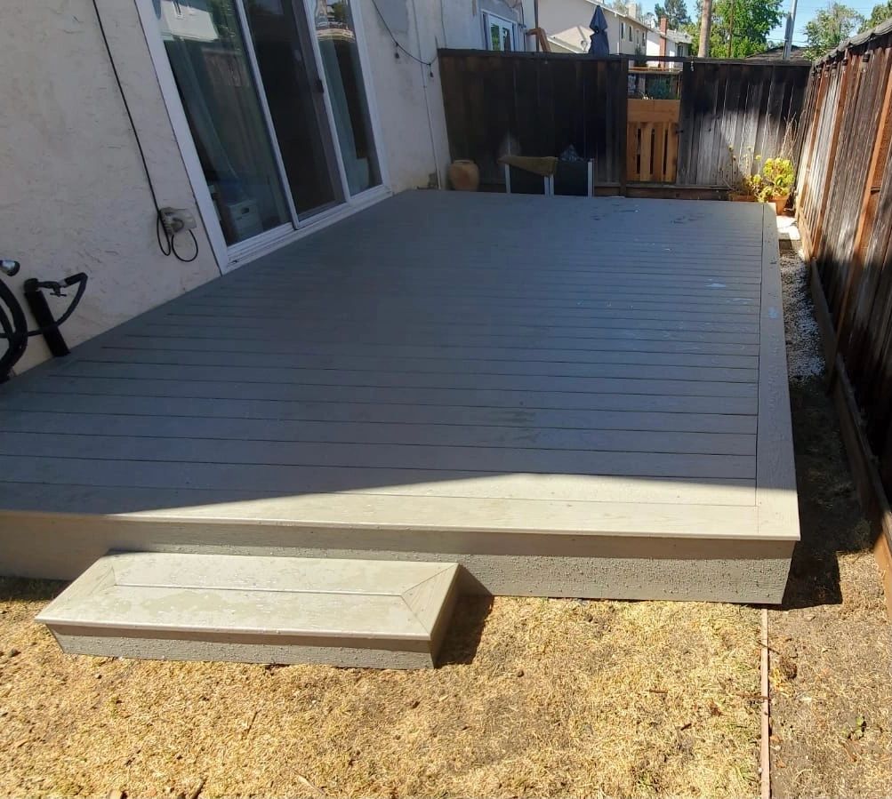 Trex deck project with gravel path after completion